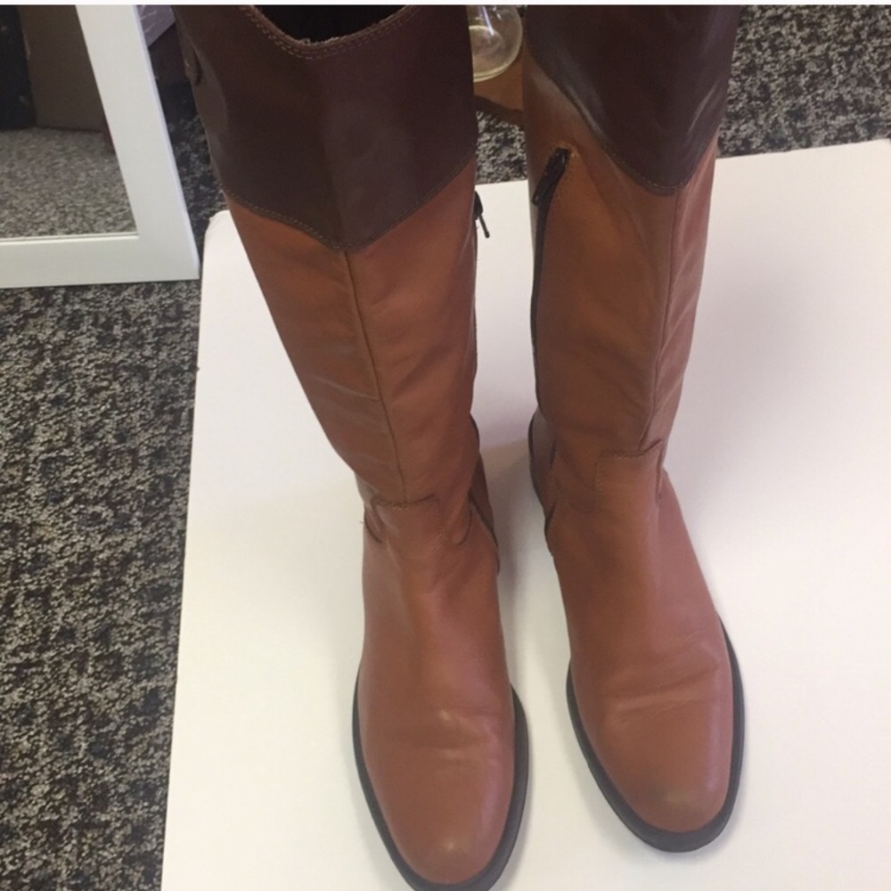 Leather knee high boots.